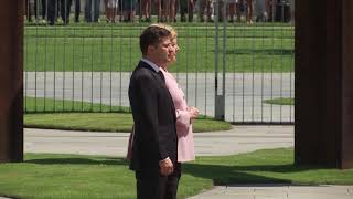 Merkel visibly shaking during ceremony [upl. by Ken]